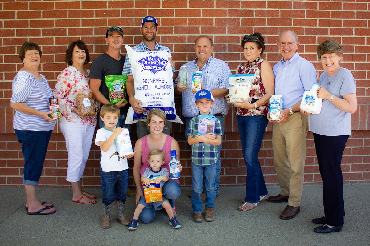 Group photo of people holding Blue Diamond products