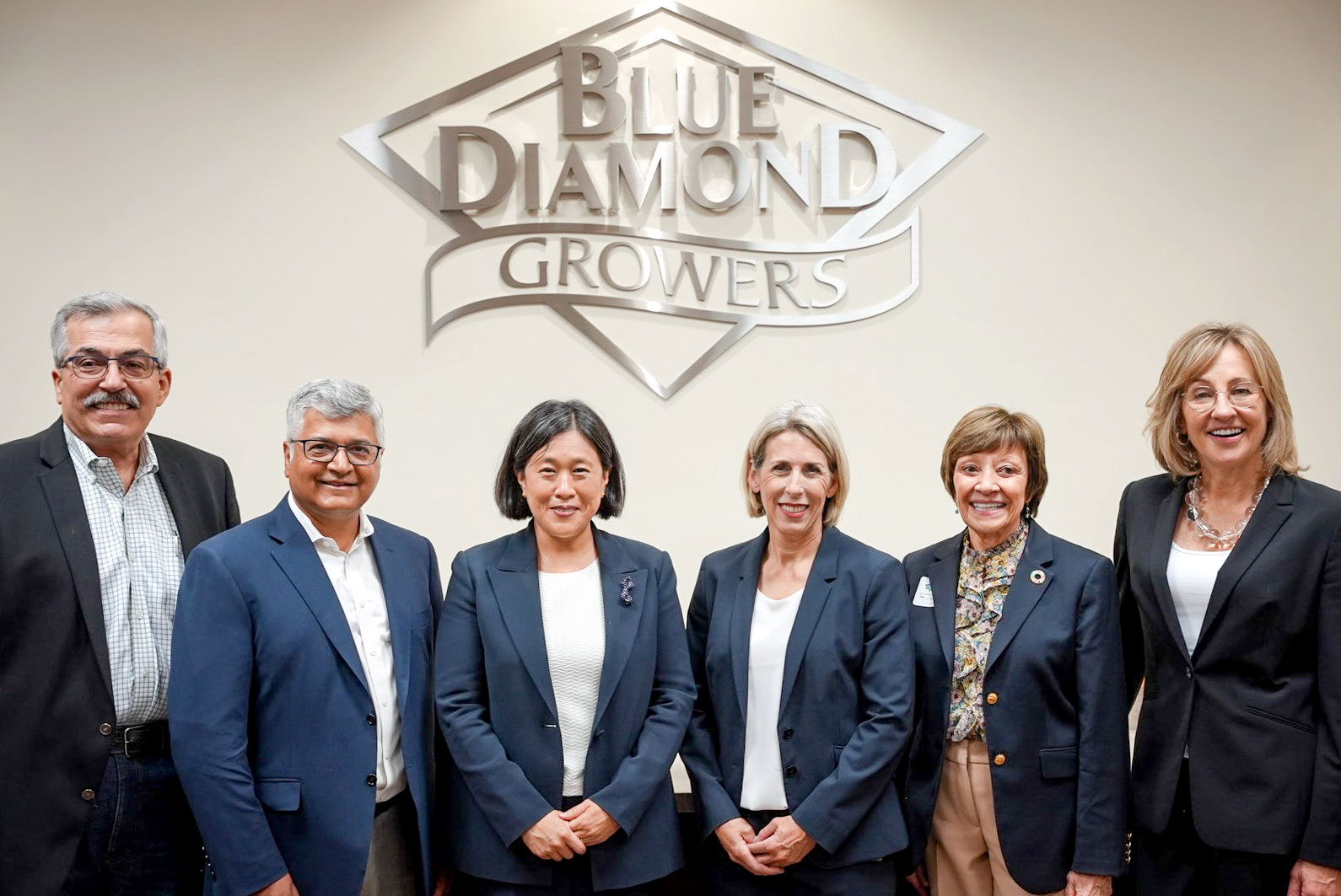 Group photo of BDG team members and Ambassador Tai
